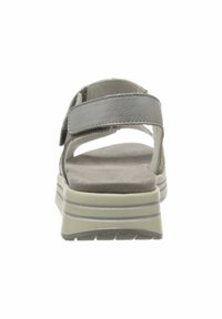 Gray sandal with adjustable strap, soft footbed, and a thick light green sole, featuring horizontal stripes for added detail.