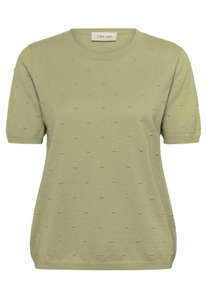 Zeleni pleteni top s kratkimi rokavi in okroglim izrezom, z rahlo elastičnim robom in teksturo pikčastega vzorca. Tkanina je mešana in prijetna na otip. Etiketa nosi napis "CREAM."