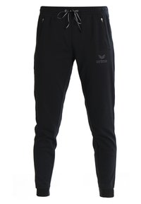 Pantaloni jogger neri realizzati in un tessuto morbido, con due tasche laterali con zip, vita regolabile con coulisse e logo ricamato sulla coscia sinistra.