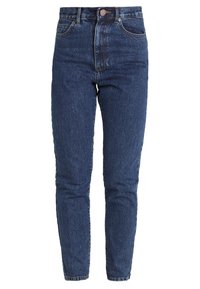 Džíny s vysokým pasem a slim-fit střihem vyrobené z tmavě modré denimu, s klasickým pětipocket designem a jemnými detaily vyblednutí.