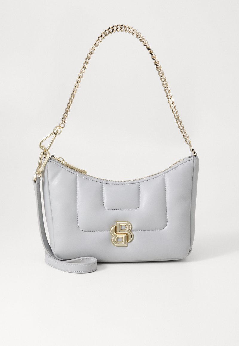 Gray leather handbag with a smooth texture, gold chain shoulder strap, and a gold logo accent on the front. Zippered closure at the top.