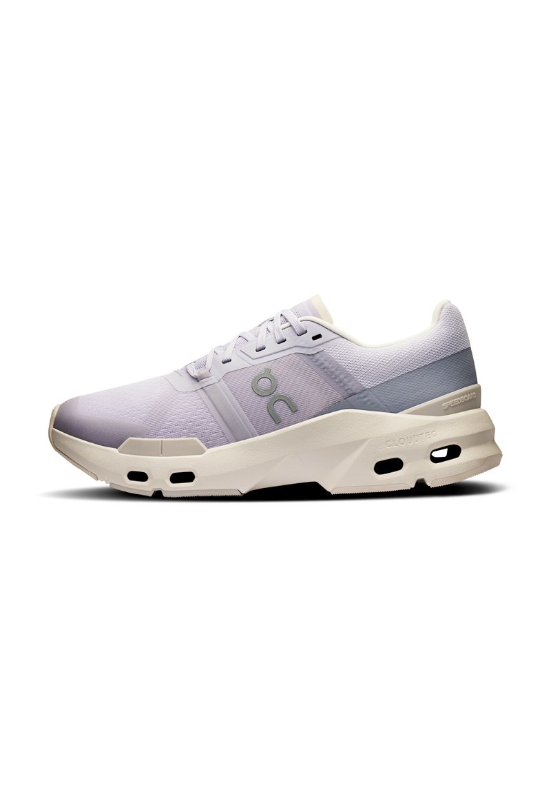 Light purple athletic shoe with a breathable mesh upper, a cushioned sole, and contrasting white accents. Features a rounded toe and lace closure.