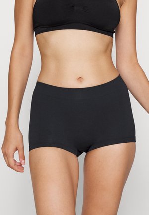 Zwarte katoenen boyshorts met ribbelstructuur, voorzien van een brede, elastische tailleband en een middelhoge pasvorm voor comfort en een goede fit.
