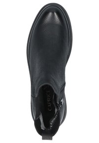 Black ankle boot with textured leather, rounded toe, side zipper detail, and pull tab at the back, featuring a low stacked heel.