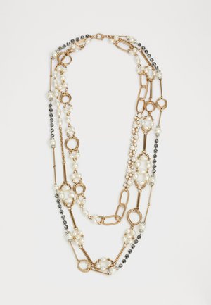 Guldtonad halsband med växlande sektioner av konstgjorda pärlor och svarta bead, med länkade kedjeelement och runda accenter genom hela.