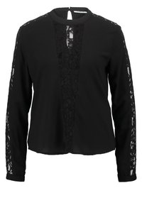 Blouse noire avec de longues manches en dentelle, un col rond et un dos à ouverture en forme de clé. La dentelle texturée et le tissu lisse créent des surfaces contrastées.