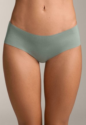 Biancheria intima hipster verde chiaro senza cuciture, con una texture liscia e una fascia larga in vita, progettata per il massimo comfort e una minima visibilità.