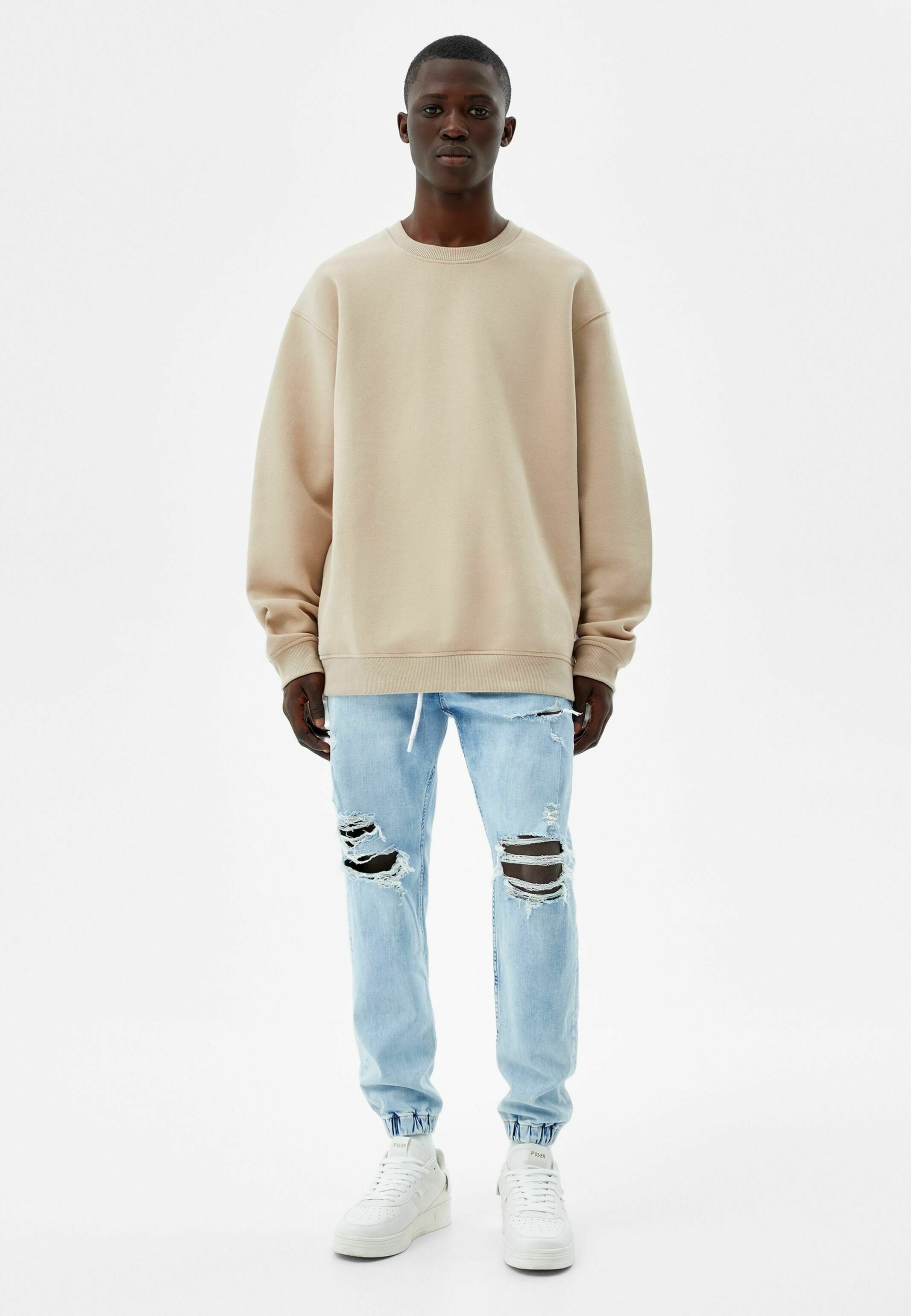 Bershka JOGGER RIPPED - Jeans slim fit - light blue denim/carta da zucchero  - Zalando.it