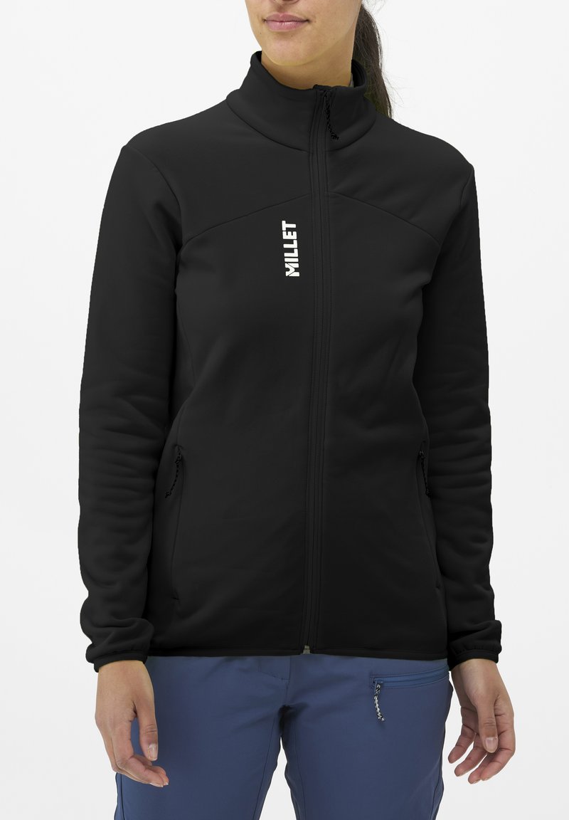 Black fleece jacket with high collar, front zipper, and two side pockets. Features logo in white on chest. Smooth texture and fitted design.