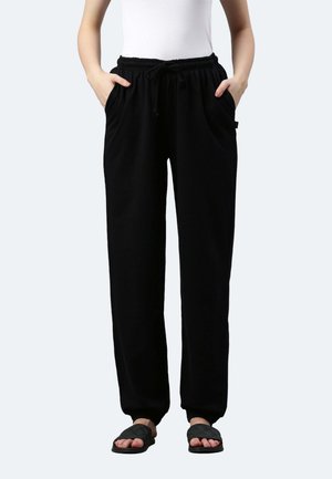 UNISEX BRYAN - Pantaloni sportivi - noir