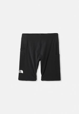 Shorts noirs en tissu extensible, dotés de deux poches latérales et d'un accent de logo sur la jambe inférieure gauche. Texture lisse, design arrivant aux genoux.