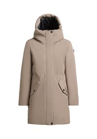 Long beige hooded winter coat with flap pockets and button closures, front zipper concealed by fabric placket, black inner lining.