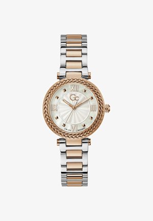 Montre ovale avec un boîtier en rose gold, un bracelet en acier inoxydable argent et rose gold, un cadran en nacre et des index romains.