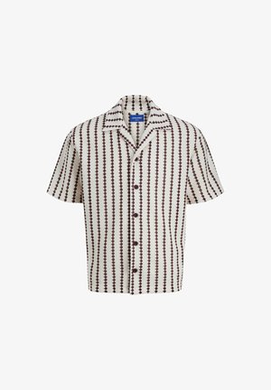 Majica s kratkimi rokavi in ovratnikom, ki ima kremno ozadje z maroon poševnimi vzorci in sprednjim gumbom za zapiranje. Mehka teksturirana tkanina.