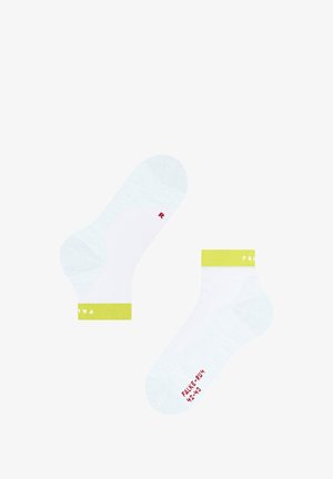White ankle socks with lime green ribbed cuffs, featuring "FALKE" branding and size markings in red. Made of a soft, textured material.