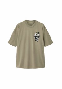 Olivengrøn bomuld t-shirt med løs pasform, korte ærmer og et kraniegrafik med en slange på brystet.