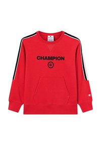 Czerwona bluza z okrągłym dekoltem, długimi rękawami, czarno-białymi paskami po bokach, kieszenią z przodu oraz logo "CHAMPION" w kolorze czarnym.