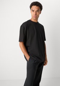 Calvin Klein Jeans MONOLOGO GRAPHIC OVERSIZED TEE - Print T-shirt - black