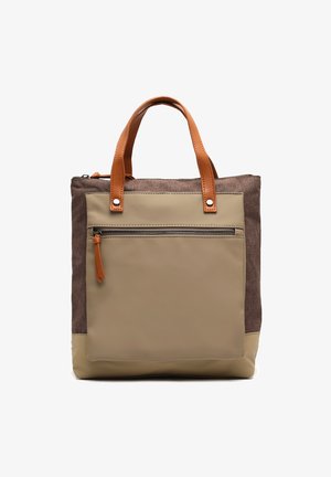 Tote bag with brown fabric exterior, beige synthetic bottom and front, leather handles, and a zippered front pocket with a leather pull tab.