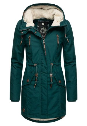 Parka en turquoise avec une capuche doublée de fausse fourrure, des poches zippées et des cordons réglables à la taille et à la capuche pour un ajustement sur mesure.