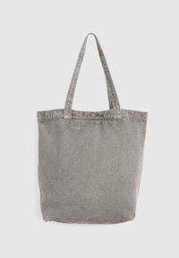 Sac cabas en toile grise avec deux bretelles, design simple, sans logos ni décorations visibles.