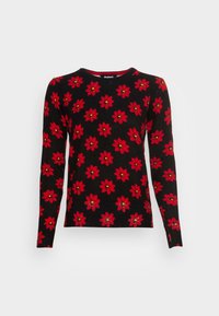 Schwarzer Pullover mit langen Ärmeln, der ein florales Muster mit roten Blumen und gelben Zentren aufweist. Rippenstruktur am Kragen und Saum mit einer figurbetonten Silhouette.