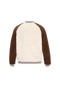 Kurtka polarowa z kremowym korpusem i brązowymi raglanowymi rękawami. Posiada prążkowane mankiety i dół w paski. Miękka tekstura i casualowy design.