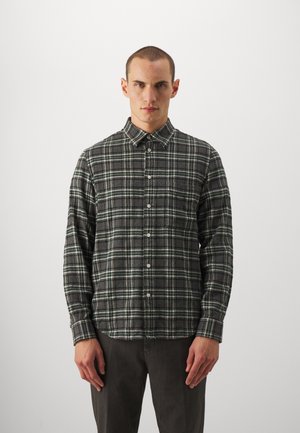 Gray flannel shirt with green and white plaid pattern, button-up design, collar, and long sleeves. Fabric appears textured and soft.