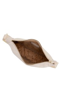 Borsa a pochette in pelle beige con una textura liscia, chiusura con zip dorata e foderatura interna a motivo con il logo 'WITTCHEN'.
