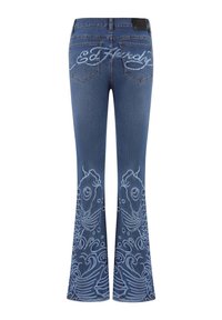 Flared denim jeans i mørkeblåt med et tekstureret fisk- og bølgemønster i lyseblå stikninger på de nederste ben og bagpå.