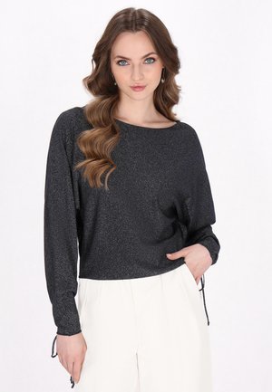 - Sweter