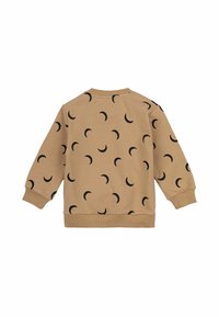 Beige sweatshirt med ett repetitivt svart halvmånemönster, ribbade ärmslut och nederkant samt en rund halsringning. Mjuk bomullsblandning.