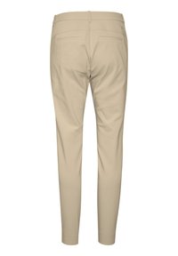 Pantaloni beige con una vestibilità slim, realizzati in un tessuto liscio, dotati di due tasche posteriori e un design pulito della vita.