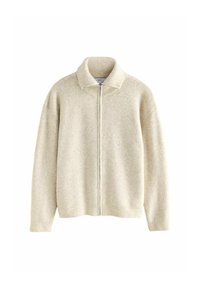 Cremefarvet strikket cardigan med ribbet struktur, høj krave og lynlås foran. Har dropped shoulders og lange ærmer, uden mønstre.