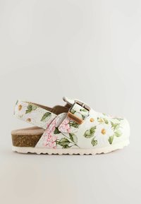 Weiße Blumenclogs mit rosa und grünen Mustern, verstellbarem Schnallenverschluss, Korksohle und strukturiertem Boden für besseren Halt. Entworfen für Komfort und Benutzerfreundlichkeit.