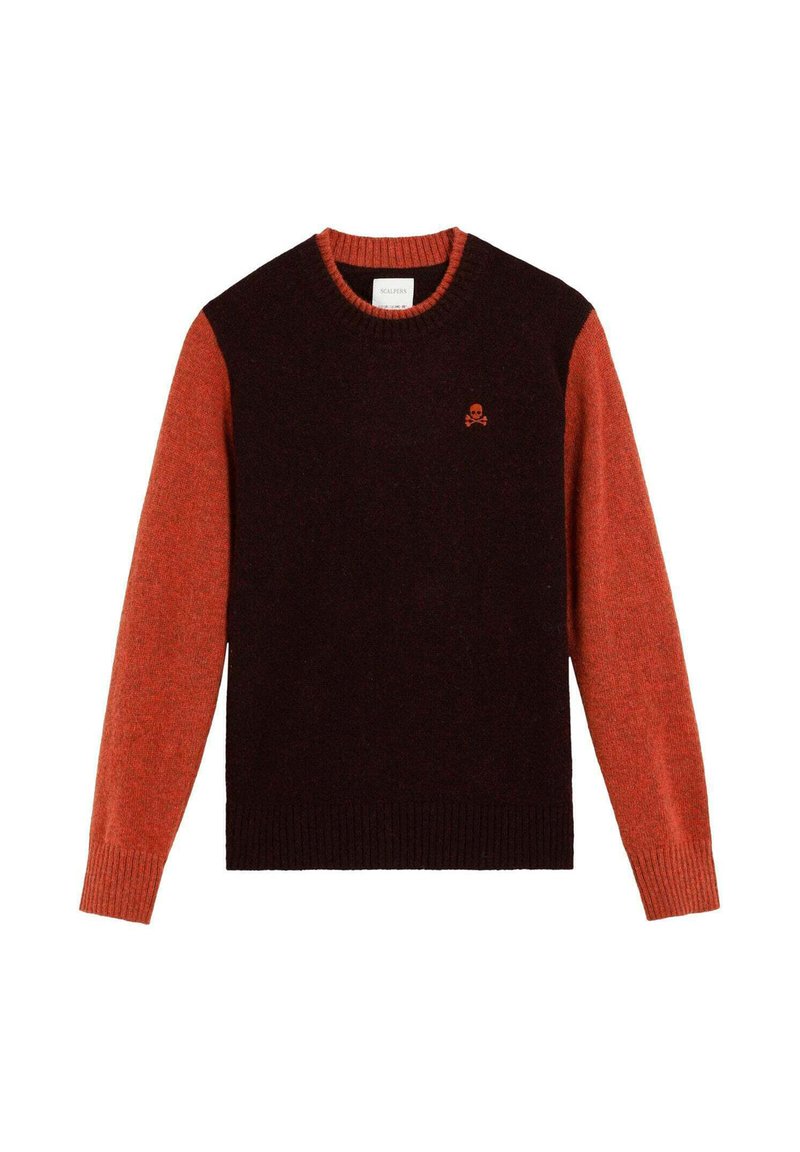 Pulover din tricot cu un corp negru, mâneci roșii și manșete cu dungi. Are un mic logo cu un craniu roșu pe piept. Textură moale, guler clasic.