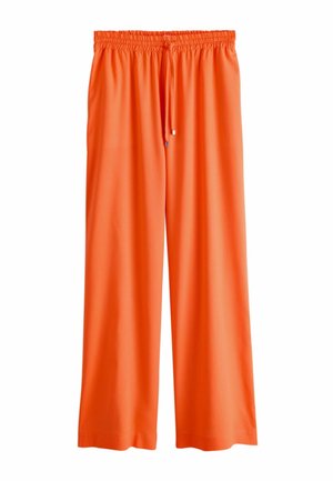 Oranžinės plačios kelnės su elastinga juosmens juosta ir reguliuojamu raišteliu. Lygus audinys be raštų ar puošmenų.