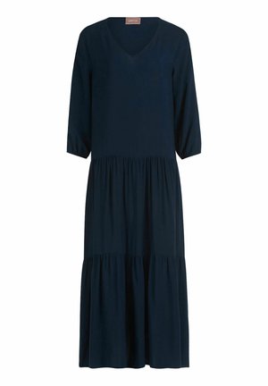 Robe longue bleu marine à volants, col en V et manches trois-quarts, confectionnée dans un tissu léger, coupe ample.