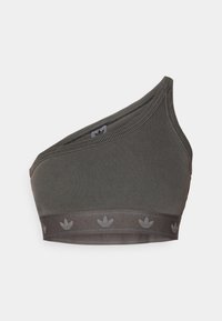 Asymmetrisk sport-bh i mörkgrönt tillverkad av ribbad tyg, med ett brett band med subtilt logomönster och en slät yta.