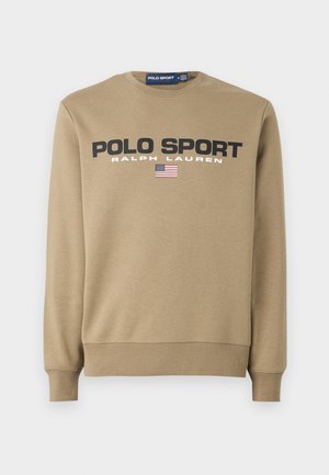 Sudadera beige con cuello redondo y mangas largas, con el texto "POLO SPORT RALPH LAUREN" y una pequeña gráfica de la bandera americana en el frente.