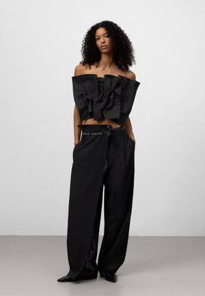 Rankning 4: ADOLFO DOMINGUEZ - Tygbyxor