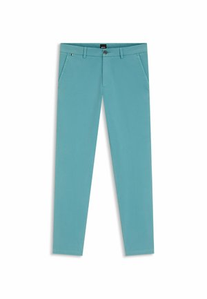 Pantaloni in cotone turchese chiaro a vestibilità slim, dotati di zip frontale, chiusura con bottone e due tasche laterali. Tessuto liscio, senza fantasie.