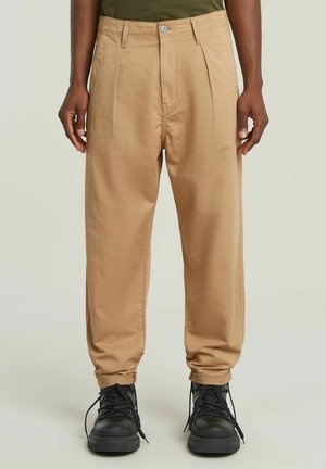PLEATED  RELAXED  - Trousers - lion gd