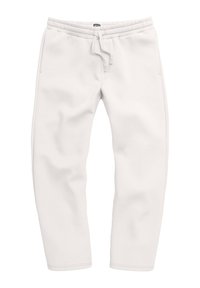 Hvide sweatpants med elastisk talje, snor og sidelommer. Stoffet har en glat tekstur og et afslappet fit.