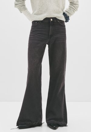 LOOSE BELL BOTTOM - Trapezaste traperice - black