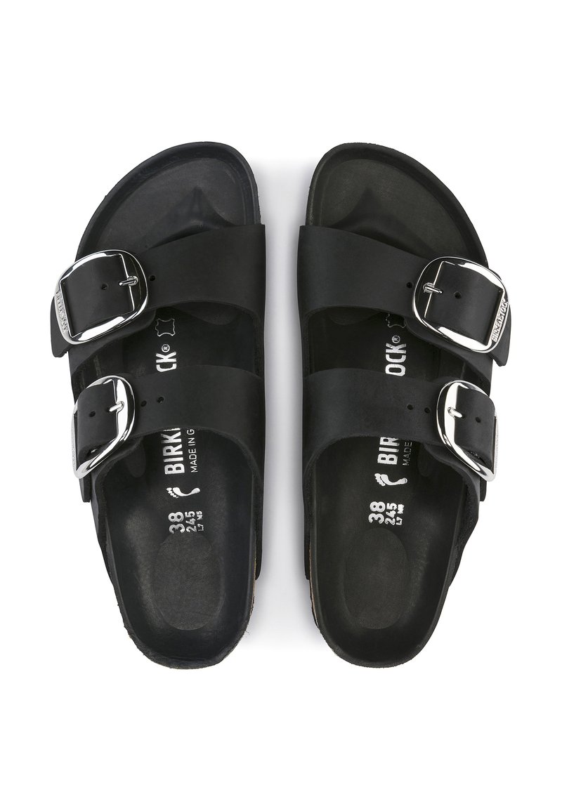 Schwarze Sandalen mit zwei verstellbaren Schnallen, aus synthetischem Material, mit einem konturierten Fußbett und strukturiertem Innenboden. Größe 38.