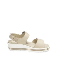 Beige leather sandal featuring a wide front strap, adjustable ankle strap, and a white wedge sole with gold accent stripes.