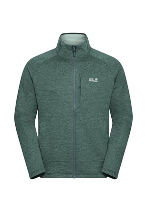 Green fleece jacket with a zip front, high collar, and smooth texture. Features a logo on the chest and contrasting seam details.