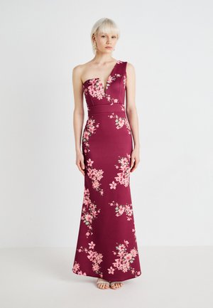 Burgundy floral dress with a one-shoulder design, fitted silhouette, and a deep V-neck. Features pink flower patterns and a floor-length hem.