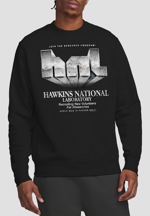 NETFLIX, STRANGER THINGS  HAWKINS LAB LOGO - Sweatshirt - black